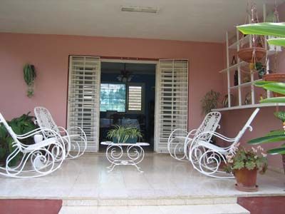 'Back terrace' is what you can see in this casa particular picture. Casas particulares are an alternative to hotels in Cuba. Check our website cuba-particular.com often for new casas.